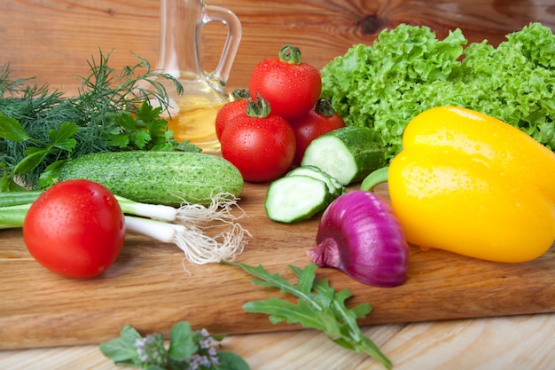 Fresh vegetables on cutting board.