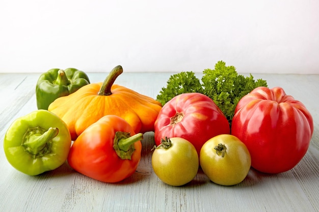 Fresh vegetables from the garden on a rustic wooden blue table