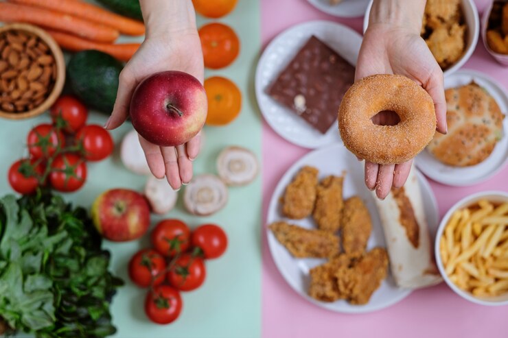 Fresh vegetables and fruits against junk food