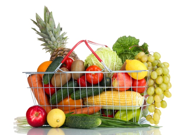 Fresh vegetables and fruits in metal basket isolated on\
white