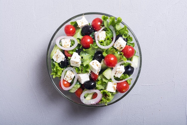 Fresh vegetables greek salad Healthy food on wooden background