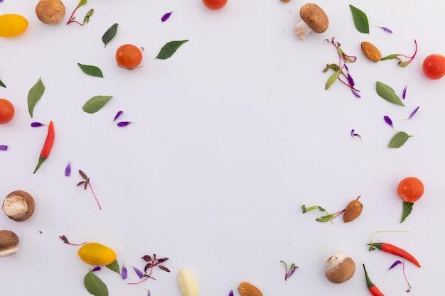 Fresh vegetables and leaves arranged in circle on white background. fresh produce green vegetables healthy eating organic food preparation concept.