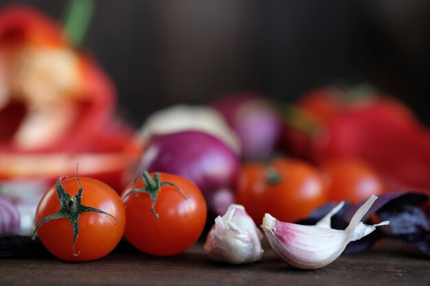 Fresh vegetables on old rustic wooden table