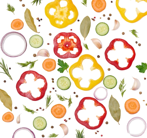 Fresh vegetables onion carrot yellow and red bell peppers a bunch of rosemary on a white isolated background