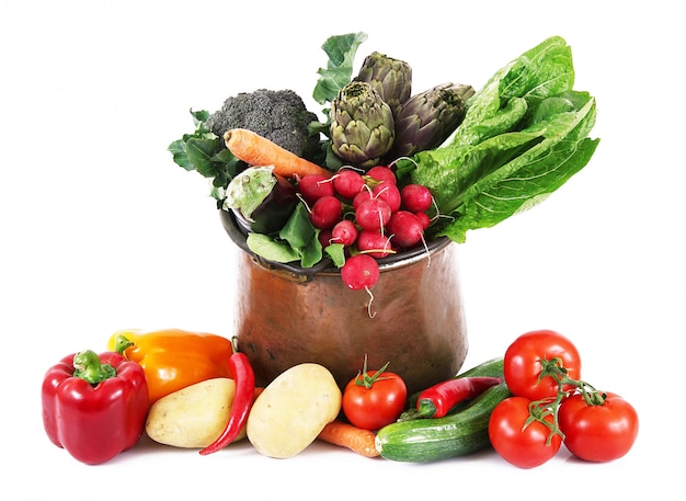 fresh vegetables in pot isolated