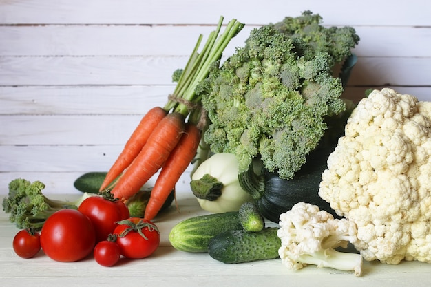 Fresh vegetables rustic wooden background