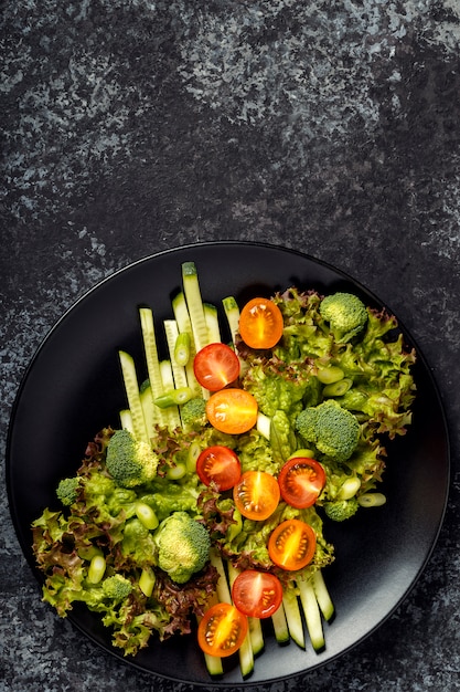 Fresh vegetables salad, top view.