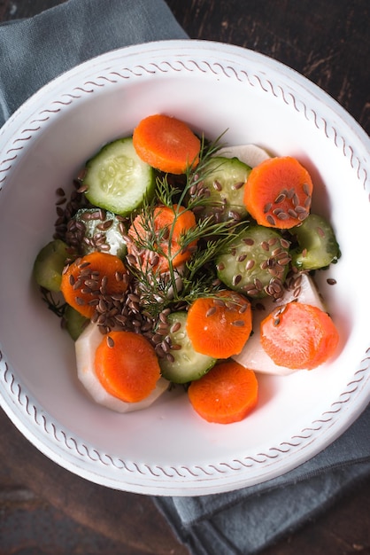 Fresh vegetables salad with daikon radish and carrot clozeup