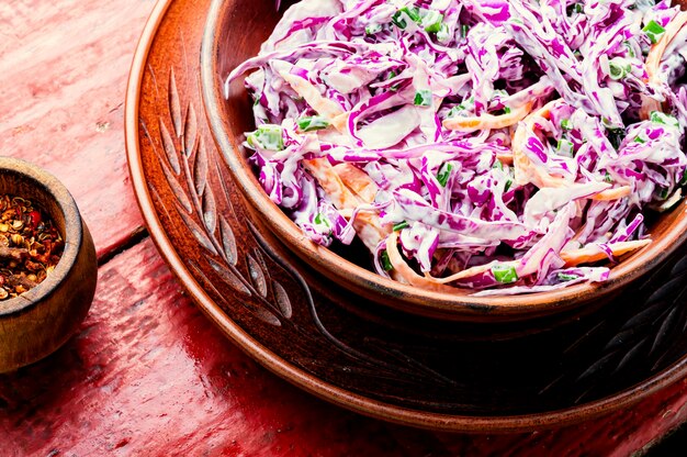 Fresh vegetables salad with purple cabbage and carrot.Coleslaw salad