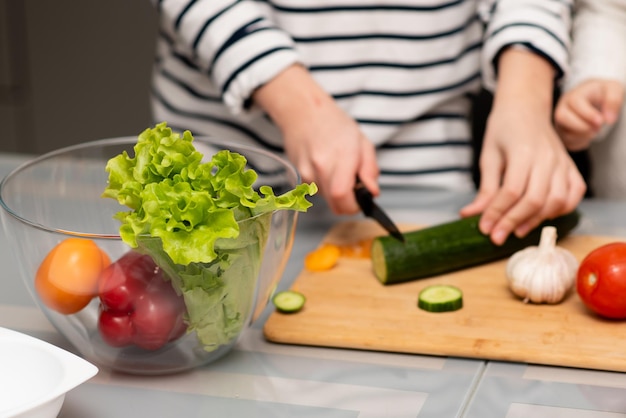 Fresh vegetables in a transparent plate on the table