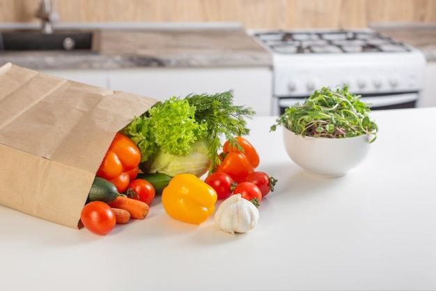 fresh vegetables on white table in kitchen