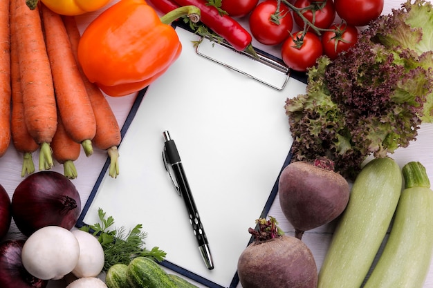 Fresh vegetables with a clipboard