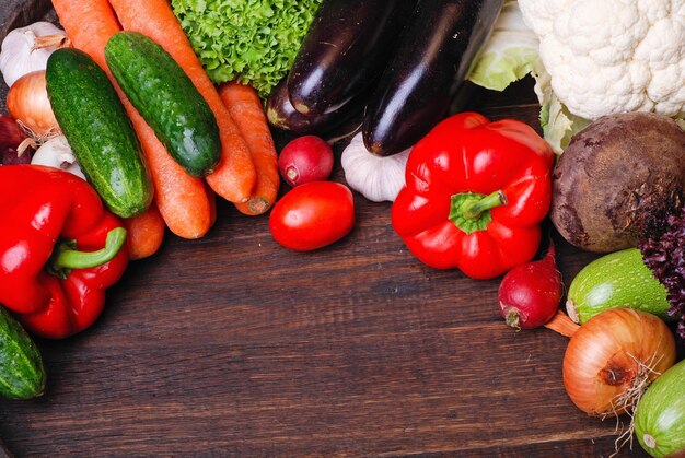 fresh vegetables on wooden background