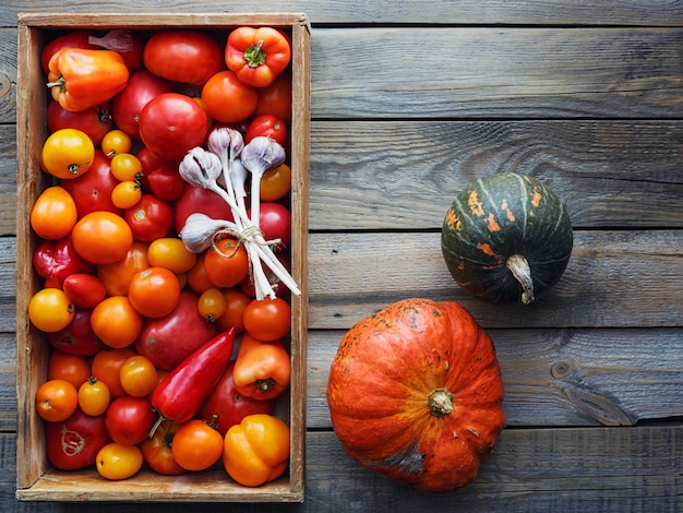 Fresh vegetables in wooden box on the table