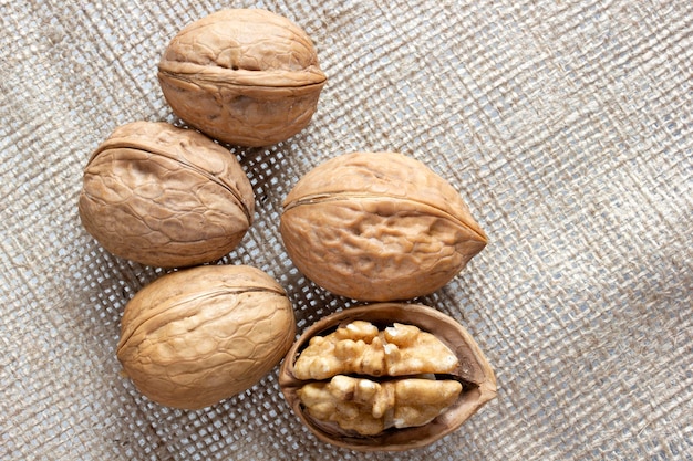 Fresh walnuts on burlap Healthy food