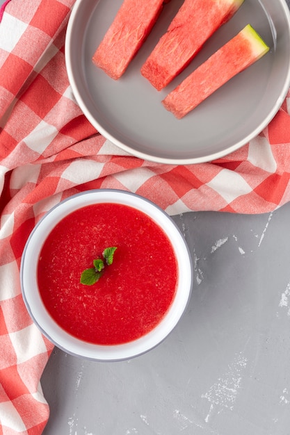 Fresh watermelon mint juice on gray background from above