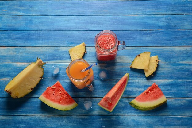 Fresh watermelon and pineapple cocktails in glasses