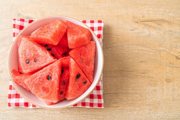 fresh watermelon sliced  in white bowl