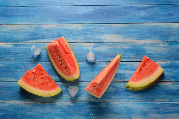 Fresh watermelon slices with ice cubes