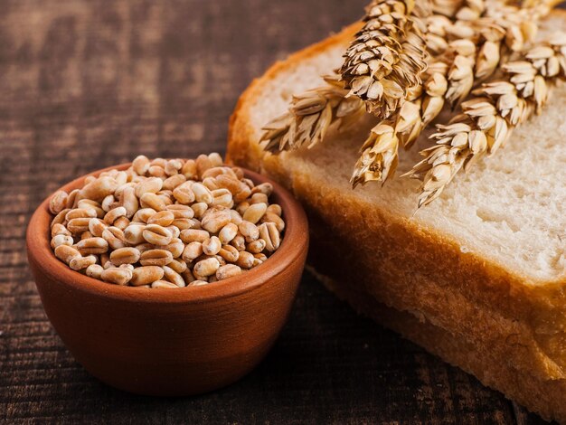 Fresh wheat grains and flour