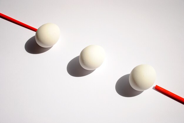 Fresh white eggs on bright background