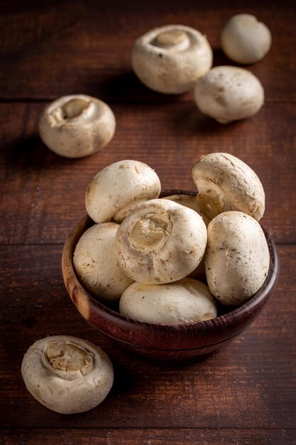 Fresh white mushrooms on the table