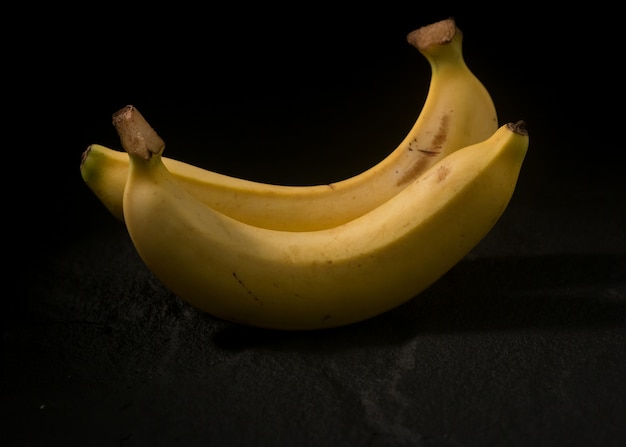 Fresh Yellow banana is Delicious isolate on Black background