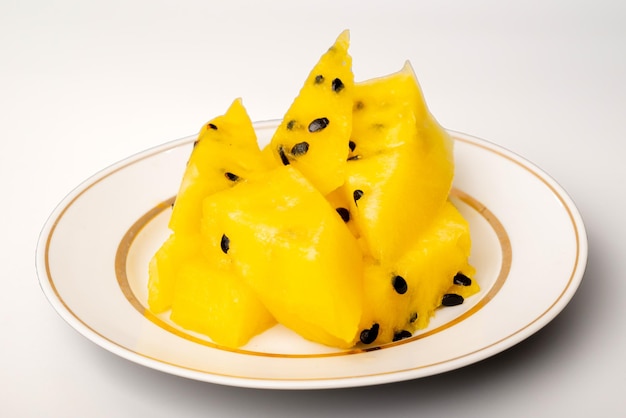 Fresh yellow watermelon slice on background juicy delicious cut watermelon with a yellow core