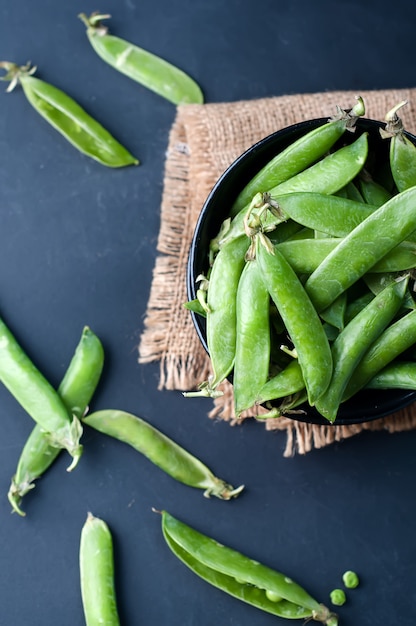 Fresh, young, unpeeled green peas