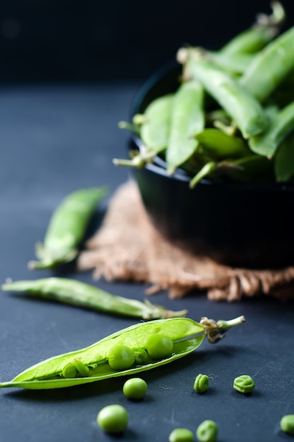 Fresh, young, unpeeled green peas