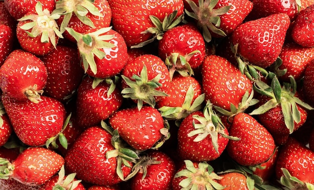 Fresh yummy strawberry texture background top view flat lay