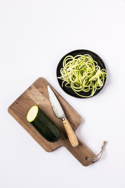 Fresh zucchini on a white background