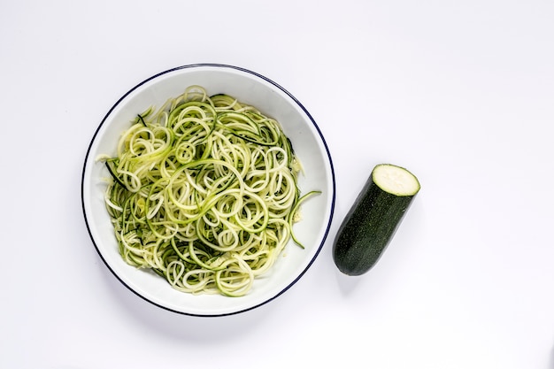 Fresh zucchini on a white background