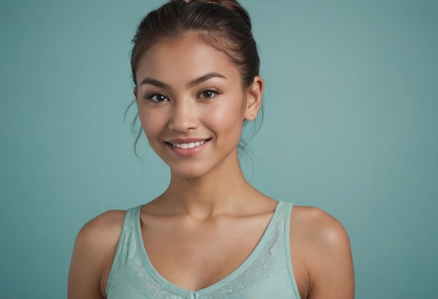 A freshfaced woman in a mint tank top beams at the camera her natural beauty and simplicity standing