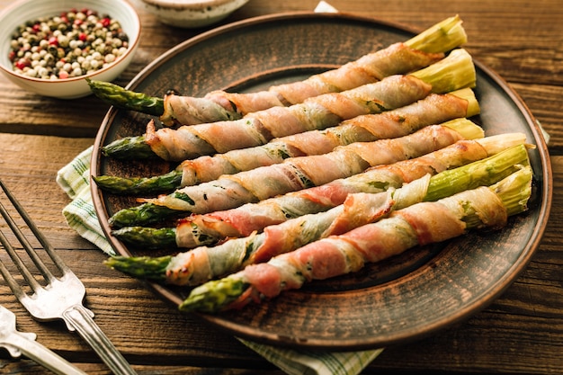 Freshly baked asparagus with bacon