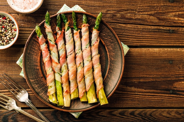 Freshly baked asparagus with bacon