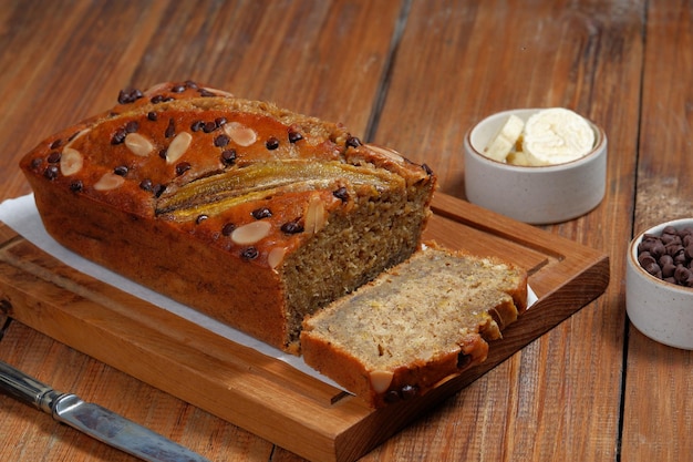 freshly baked banana bread on wooden background.	