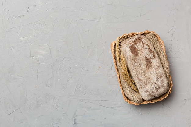 Freshly baked bread on basket against natural background top view bread copy space