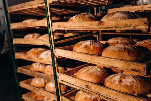 Freshly baked bread on a cart at the bakery