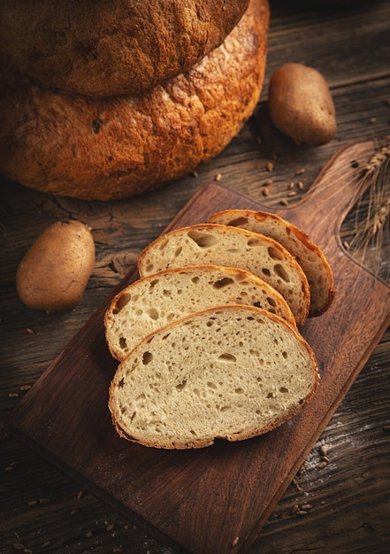 Freshly baked bread in rustic setting sliced sourdough bread