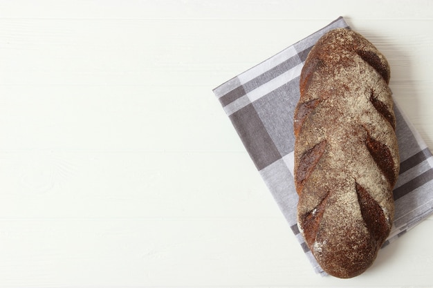 Freshly baked bread on the table closeup