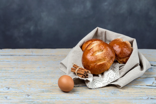 Freshly baked buns with almonds. Croissants and brioches