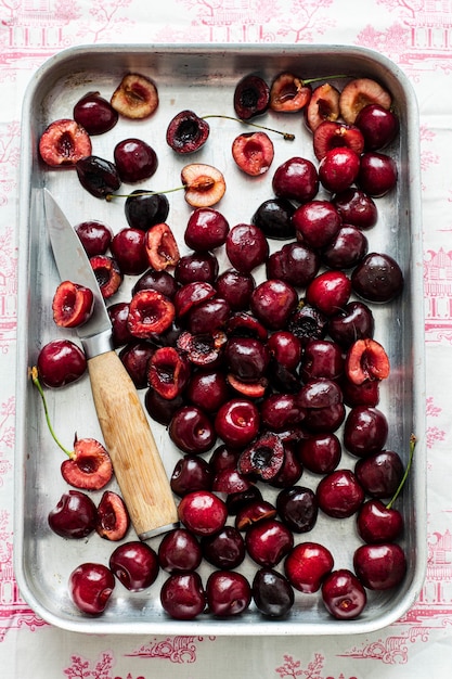 Freshly baked cherries on a baking tray