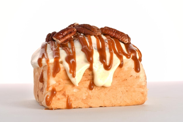 Freshly baked Cinnabon buns with cream sauce