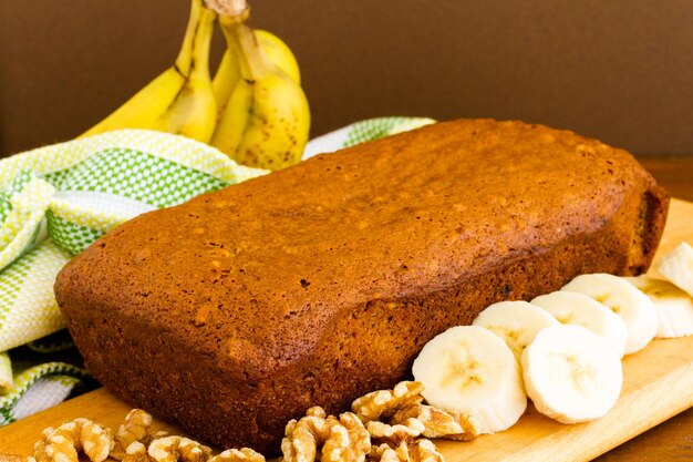 Freshly baked classic banana bread with walnuts and bananas.