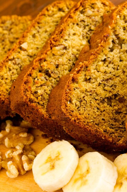 Freshly baked classic banana bread with walnuts and bananas.