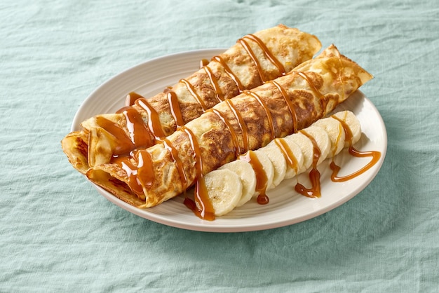 Freshly baked crepes rolls