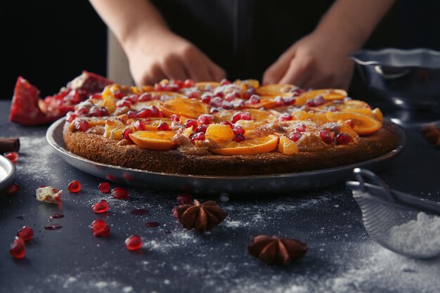 Freshly baked delicious tangerine pie on kitchen table