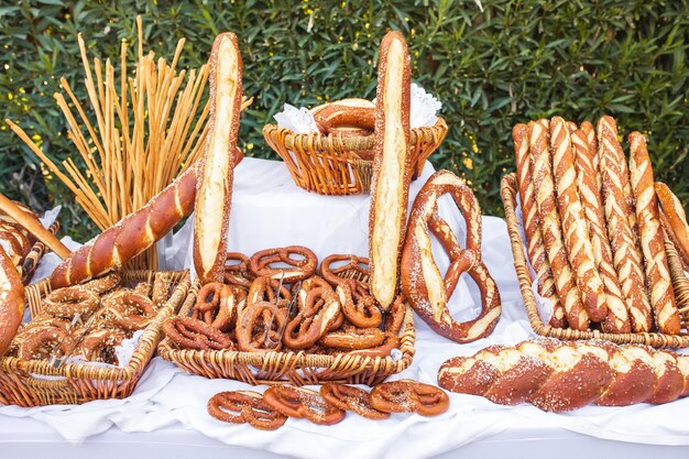 Freshly baked homemade soft pretzels with salt on wooden table Perfect for Octoberfest