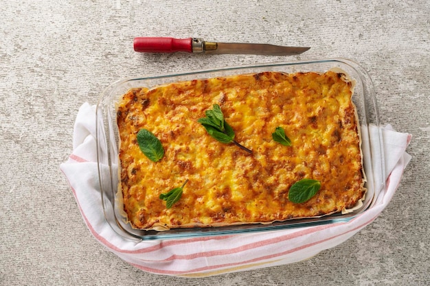 Freshly baked homemade stuffed pie in a baking dish